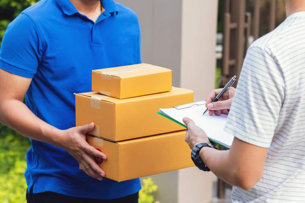 Nexuscorp-Receiving Package From a Delivery Man